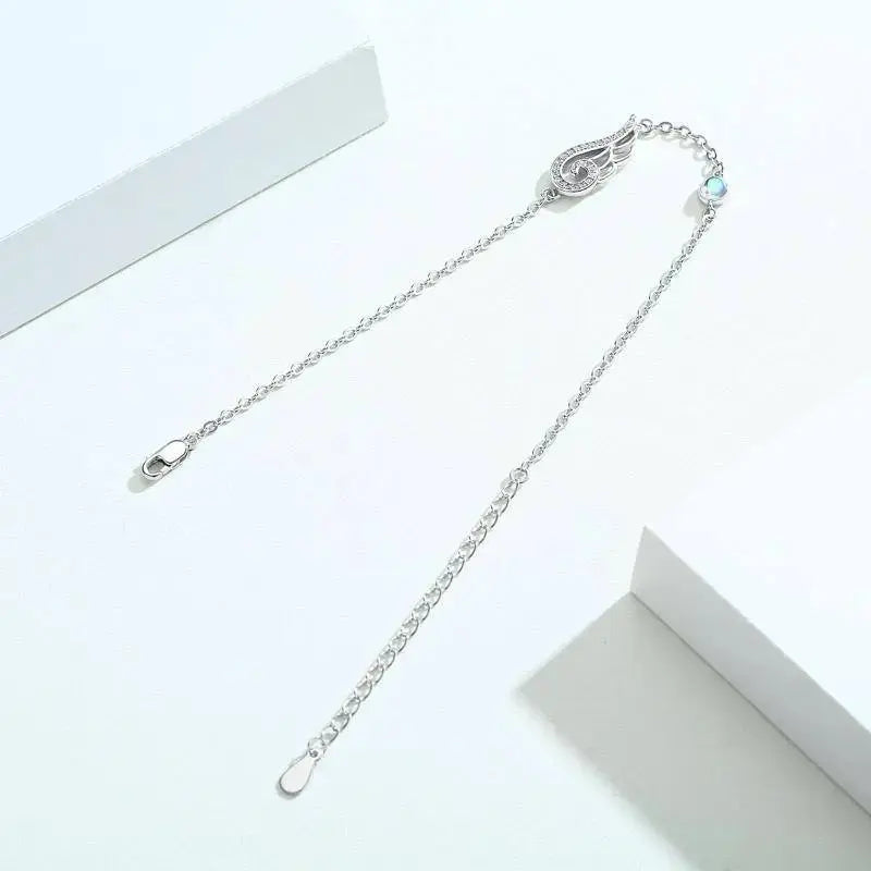 Lovcia Divine Angel Wing Bracelet for Women - Sterling Silver, Cubic Zirconia Moonstone, Adjustable Chain - A Heavenly Gift-Bracelets-Silver-0.71inch-Silver