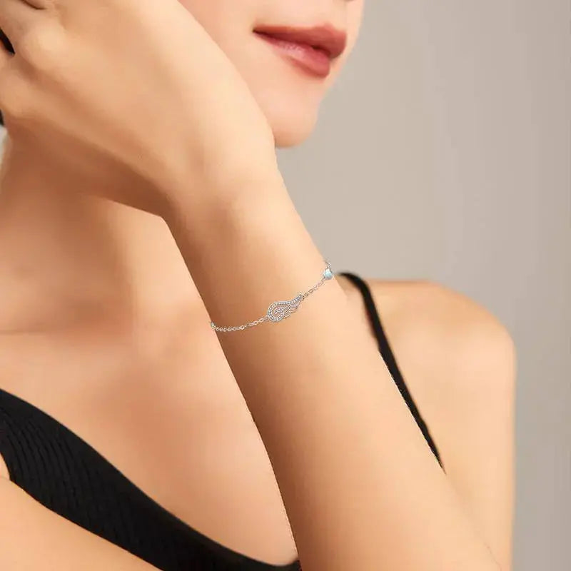 Lovcia Divine Angel Wing Bracelet for Women - Sterling Silver, Cubic Zirconia Moonstone, Adjustable Chain - A Heavenly Gift-Bracelets-Silver-0.71inch-Silver