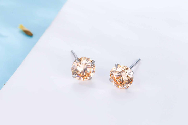 LOVCIA Elegant CZ White Round Studs Earrings for Women in 925 Sterling Silver