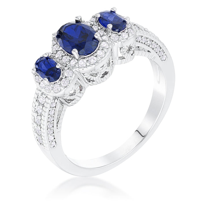 LOVCIA Sapphire Blue Oval Cut CZ 3-Stone Halo Ring with Rhodium Plating