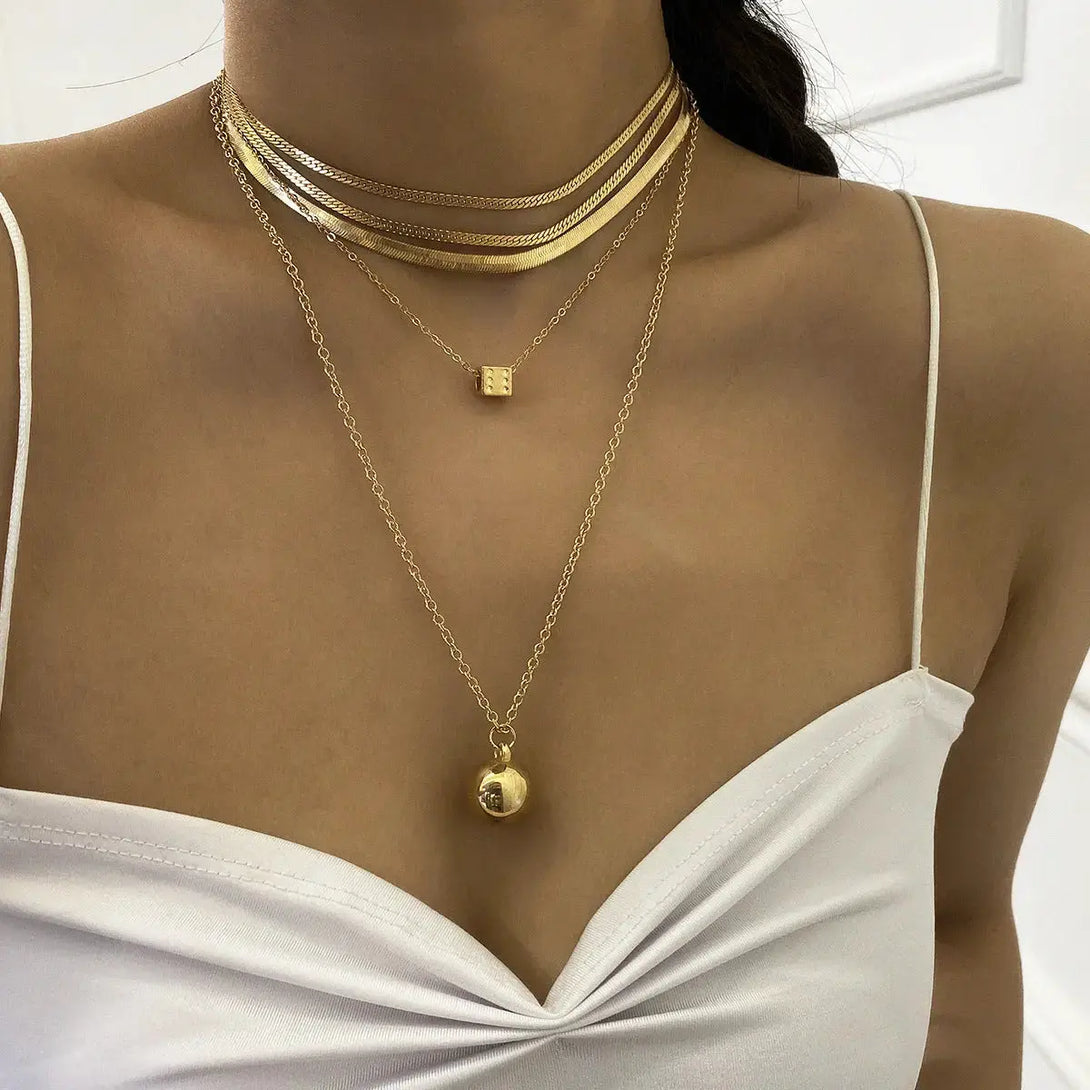 LOVCIA Golden Elegance Ball Pendant Necklace for Women - Elevate Your Style