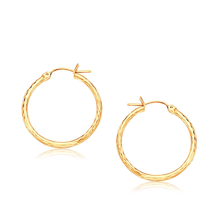 Buy LOVCIA Luxury Radiant 14k Yellow Gold Hoop Earrings with Diamond-Cut Detailing (25mm)