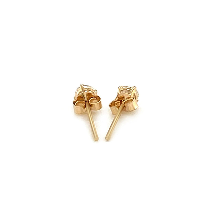 Buy LOVCIA Luxury Classic 14k Yellow Gold Round-Cut Cubic Zirconia Stud Earrings (3mm)