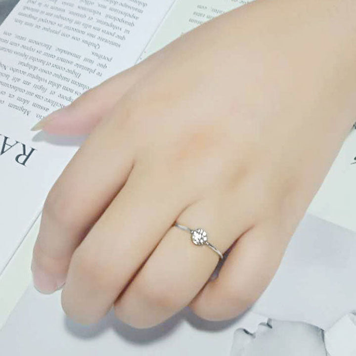 LOVCIA Rhodium-Plated Brass Ring with Clear AAA CZ Stone - Buy stylish Rings for women - Shop latest Ring design - Trendy Rings - Unique fashion Rings - Find the perfect Ring