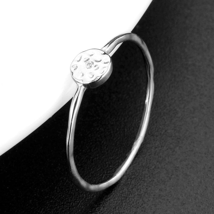 LOVCIA Rhodium-Plated Brass Ring with Clear AAA CZ Stone - Buy stylish Rings for women - Shop latest Ring design - Trendy Rings - Unique fashion Rings - Find the perfect Ring