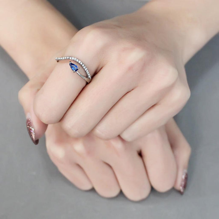 LOVCIA Stainless Steel Ring with London Blue Synthetic Spinel - High Polished Finish - Buy stylish Rings for women - Shop latest Ring design - Trendy Rings - Unique fashion Rings - Find the perfect Ring