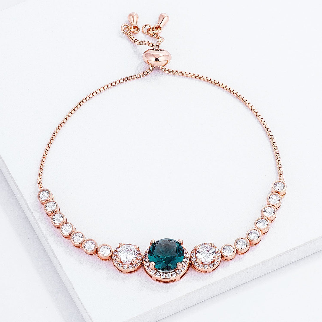Lovcia Rose Goldtone Bolo Tennis Bracelet with Blue Green Center Stone and CZ Halos-Bracelets-