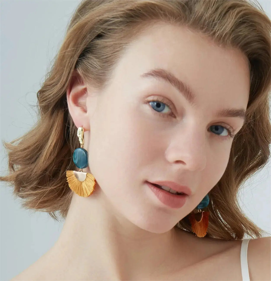 LOVCIA Exquisite Fan-shaped Tassel Earrings for Women - Unleash Your Glamour
