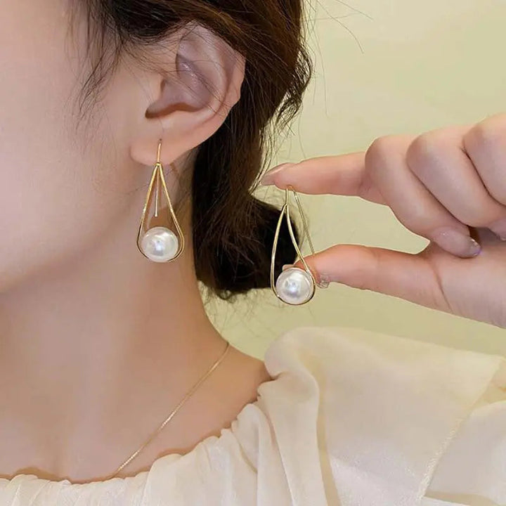 LOVCIA Elegant Hollow Water Drop Pearl Earrings for Women LOVCIA