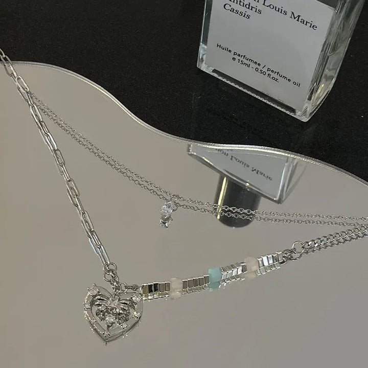 LOVCIA Hollow Heart Style Broken Silver Pendant Necklace for Women LOVCIA