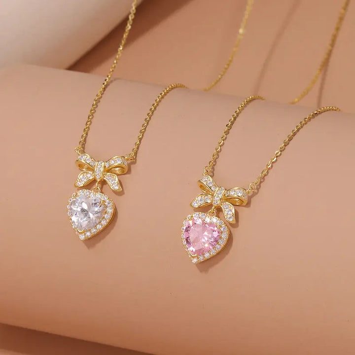 LOVCIA Gold Plated Sterling Silver Heart & Bow Pendant Necklace for Women with Sparkling Pink & Clear Gemstones LOVCIA