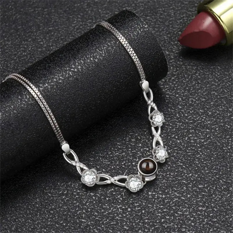 Lovcia Women's Sterling Silver Flower Charm Bracelet with Black Pearl & Zirconia Accents-Bracelets-Silver-Silver