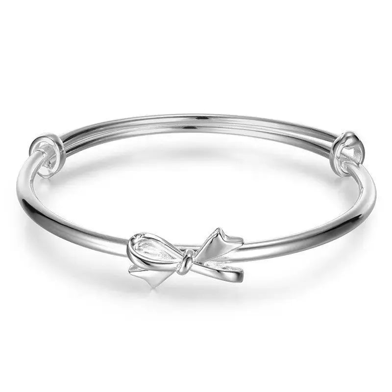 Lovcia Women's Twisted Silver Bangle Bracelet - Modern and Stylish Fashion Jewellery-Bracelets-Bow with Dangling Ball Bangle-Bow with Dangling Ball Bangle